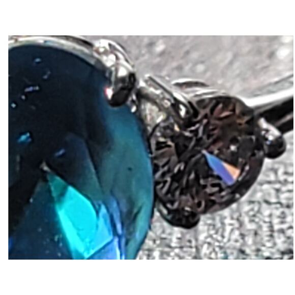 Stunning Rhodium-Plated Size 10.5 Ring with Blue Gemstone and Diamond Accents - Picture 5 of 12